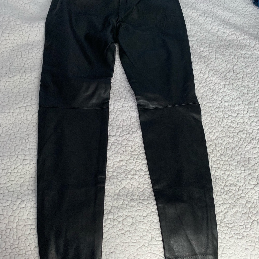 Black leather pants slightly worn